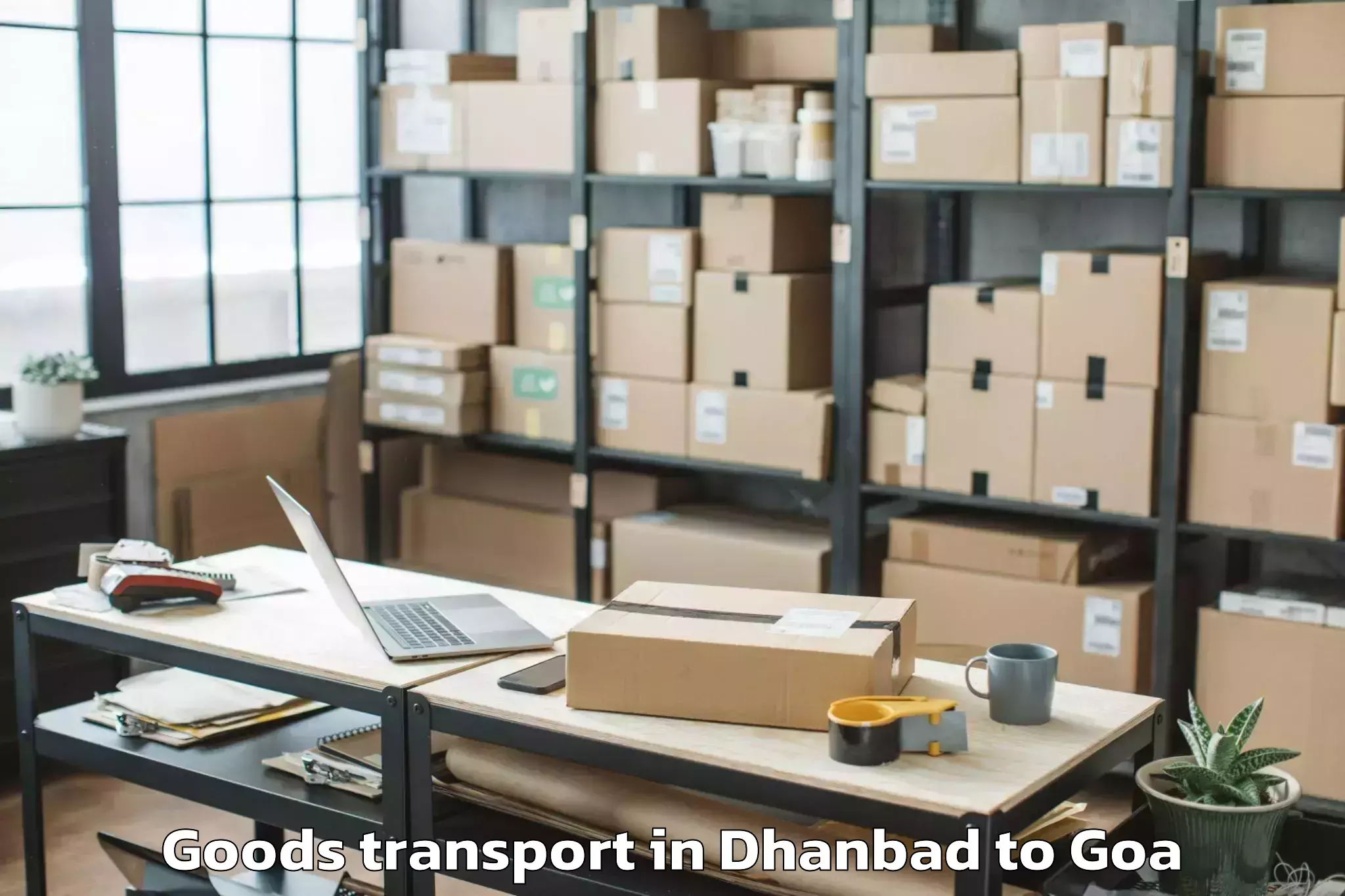 Book Dhanbad to Aldona Goods Transport